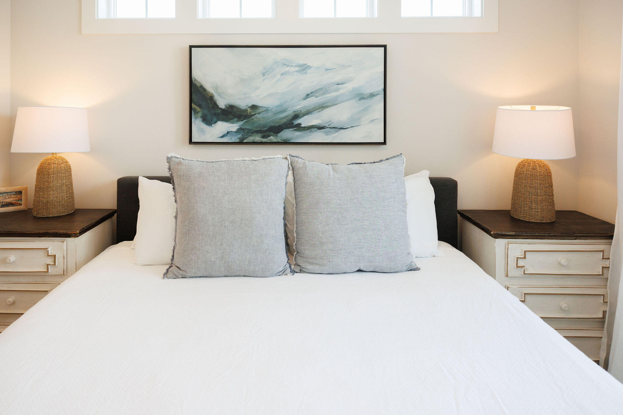 296 Milestone Dr Inlet Beach, Unit C Inlet Beach, FL 32461 - Photo 32 of 51 a bedroom with a bed and a painting on the wall