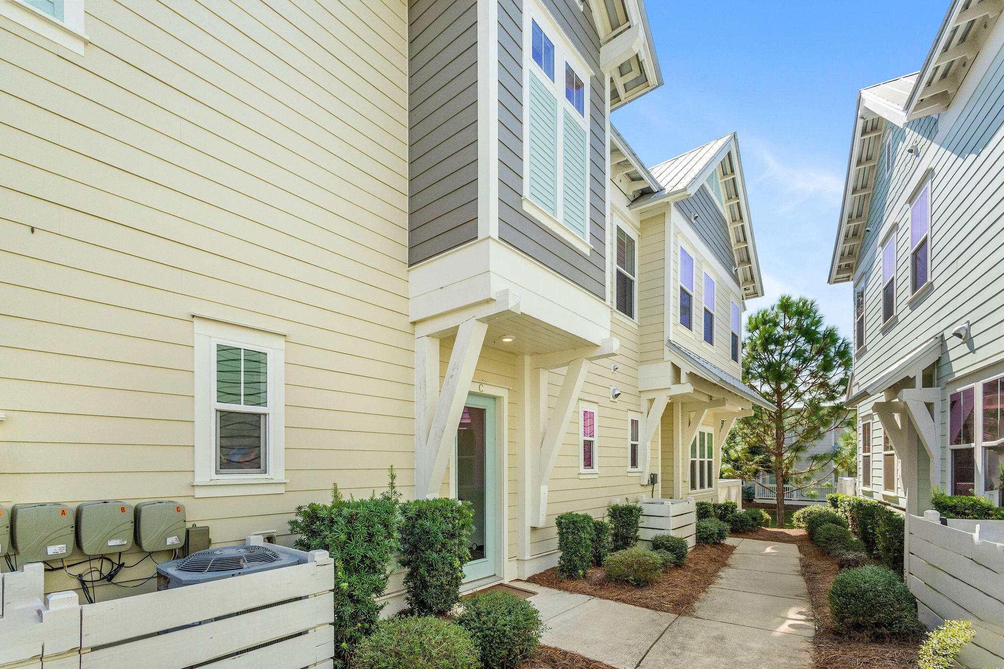 296 Milestone Dr Inlet Beach, Unit C Inlet Beach, FL 32461 - Photo 44 of 51 a front view of a multi story residential apartment building