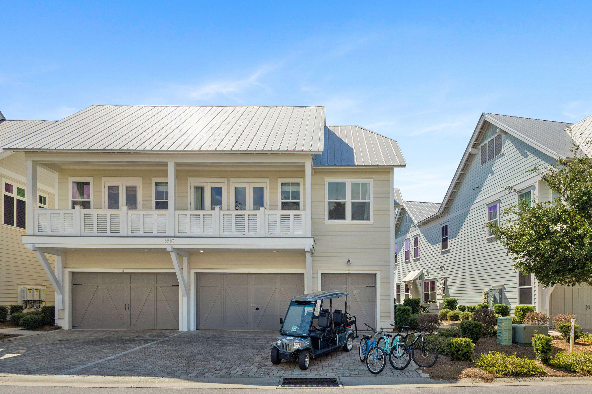 296 Milestone Dr Inlet Beach, Unit C Inlet Beach, FL 32461 - Photo 45 of 51 a front view of a house with a garden