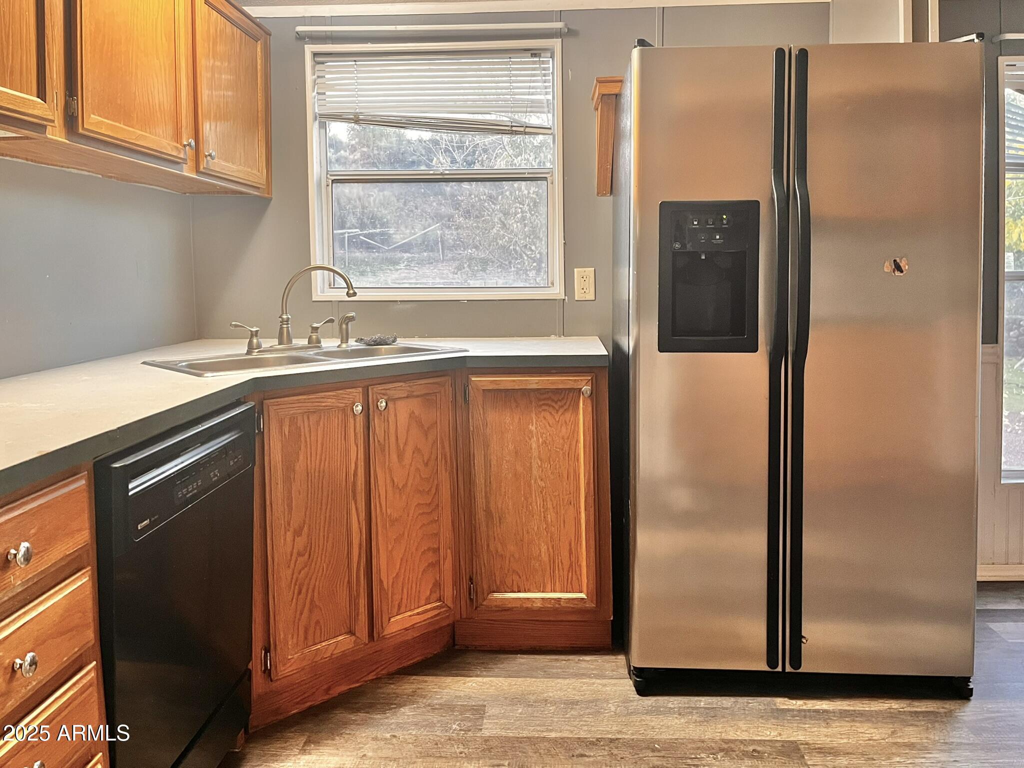 5943 North Bordeaux Road Rimrock, AZ 86335 - Photo 7 of 38 a view of a kitchen with wooden floor and cabinets