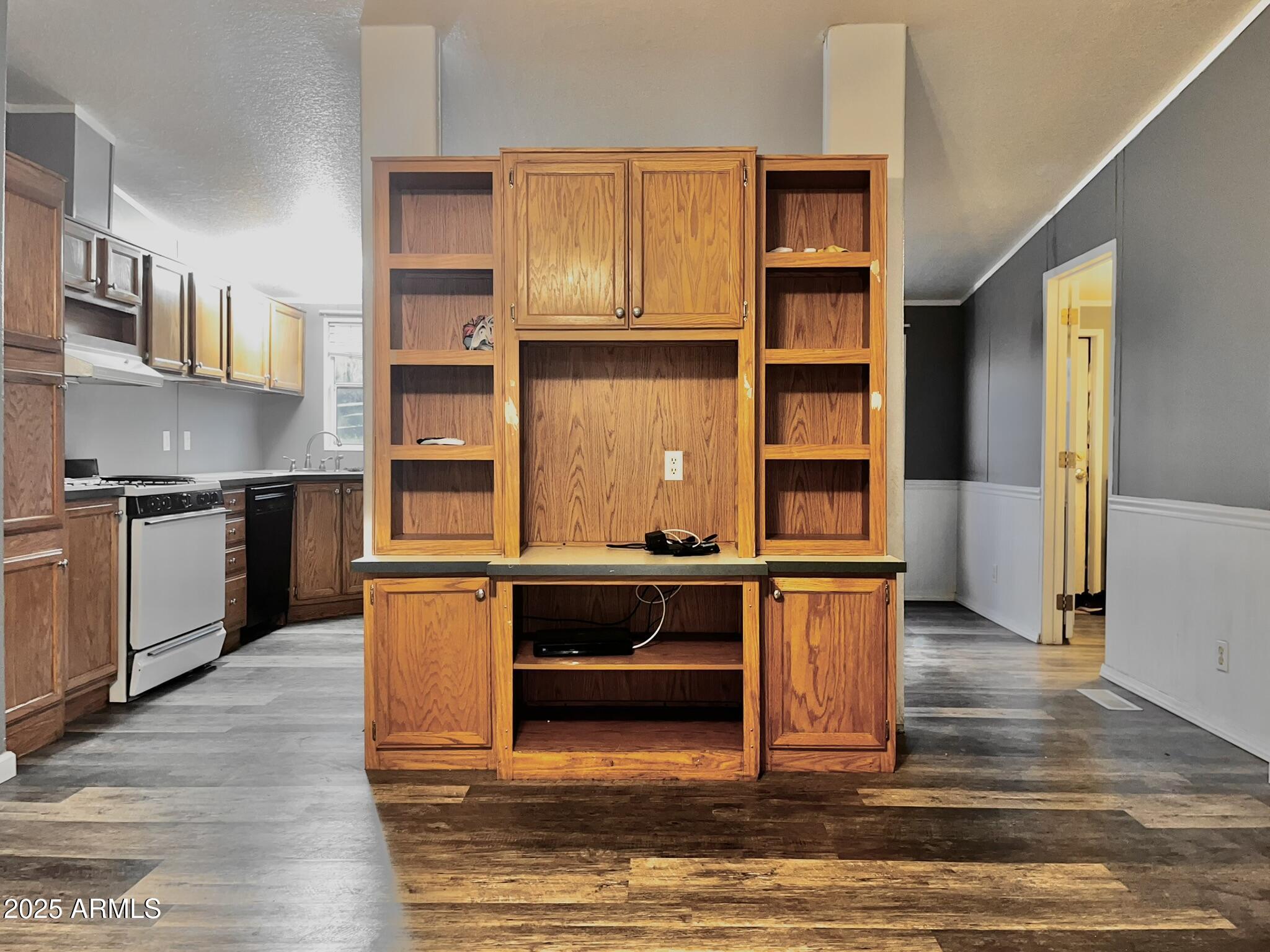5943 North Bordeaux Road Rimrock, AZ 86335 - Photo 10 of 38 a kitchen with stainless steel appliances granite countertop a stove and a refrigerator