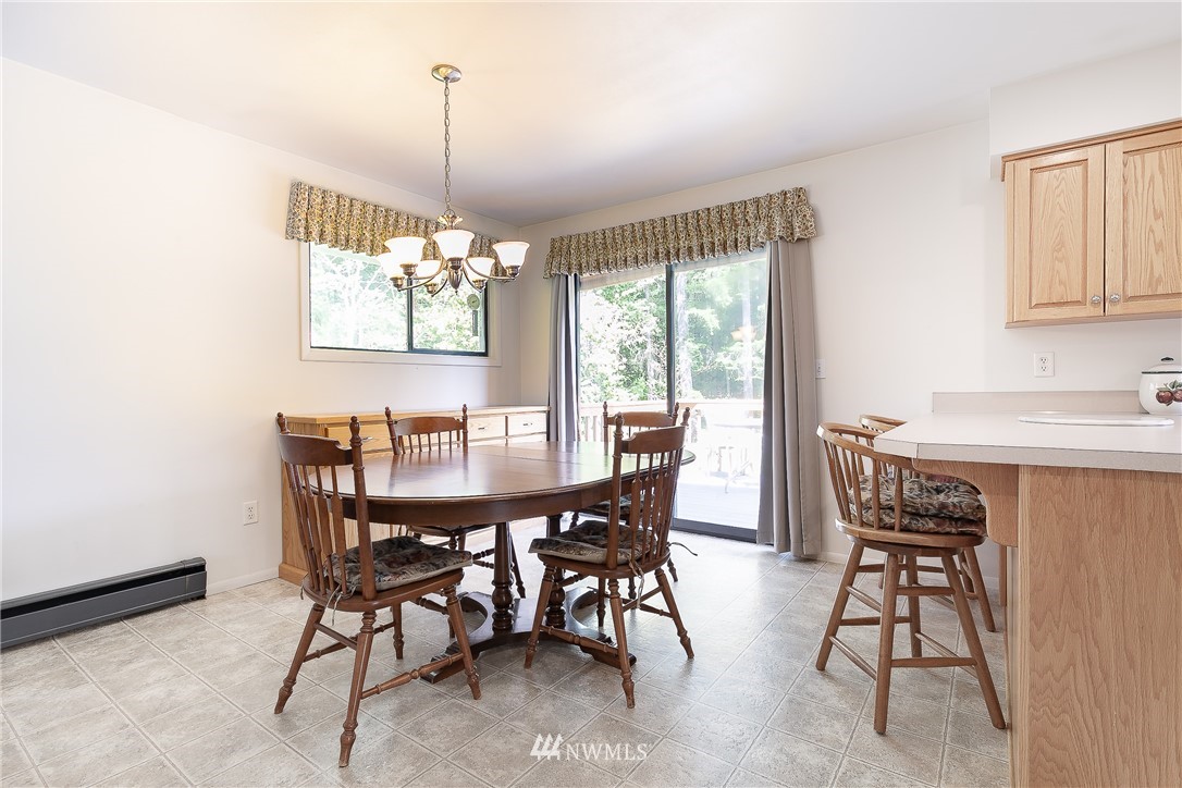8980 Kendall Road Sumas, WA 98295 - Photo 11 of 39 a view of a dining room with furniture window and outside view