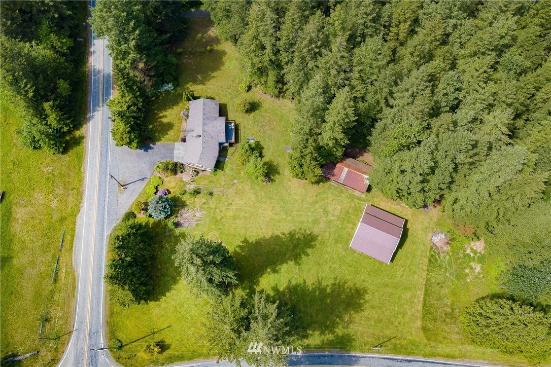 8980 Kendall Road Sumas, WA 98295 - Photo 27 of 39 an aerial view of a house with swimming pool