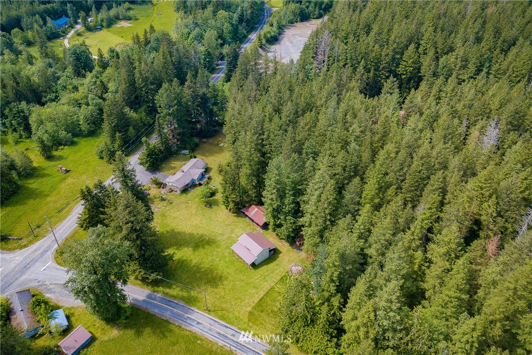8980 Kendall Road Sumas, WA 98295 - Photo 28 of 39 an aerial view of residential house with outdoor space and trees all around