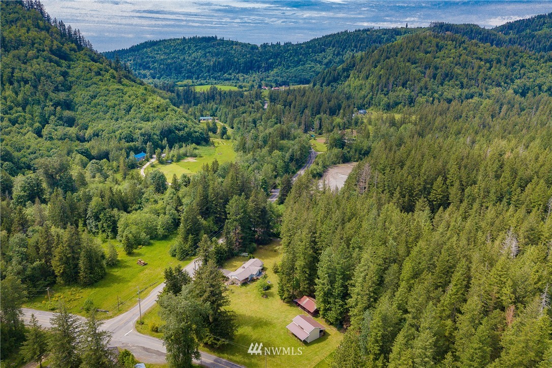 8980 Kendall Road Sumas, WA 98295 - Photo 29 of 39 a view of a lake with a yard