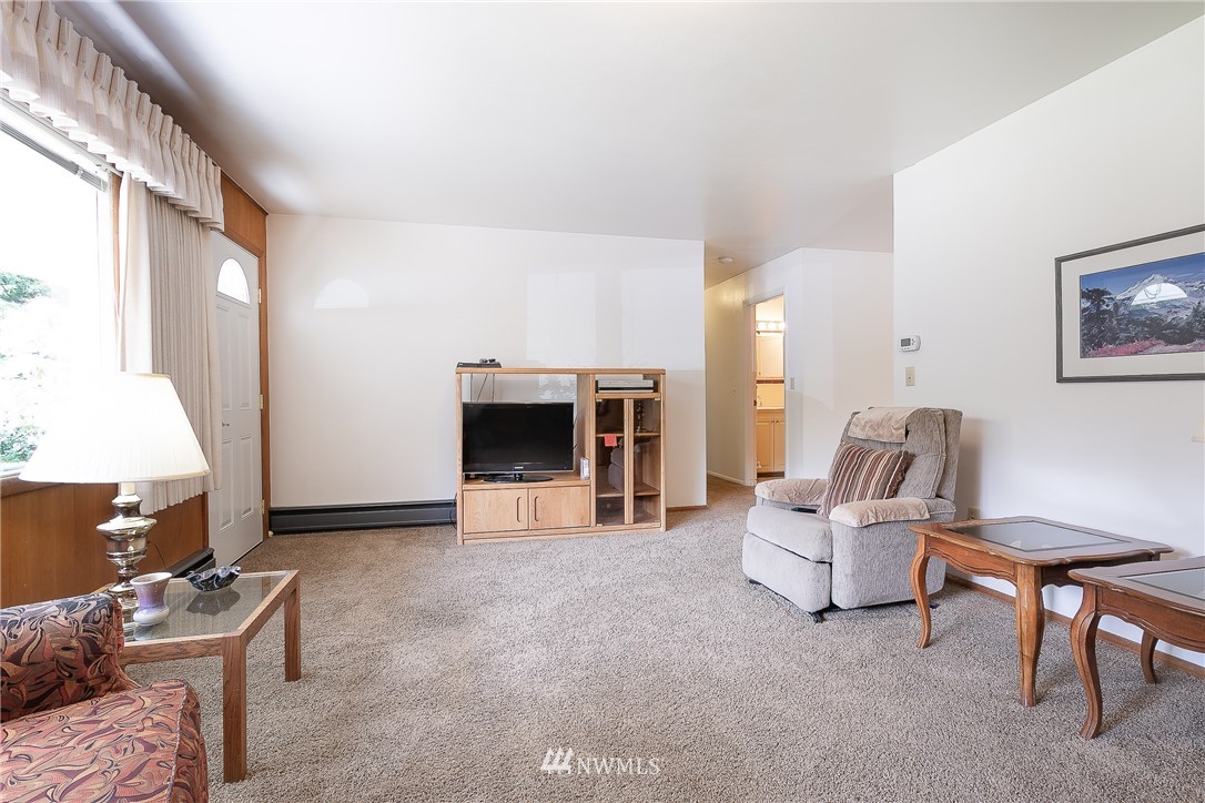 8980 Kendall Road Sumas, WA 98295 - Photo 6 of 39 a living room with furniture and a fireplace