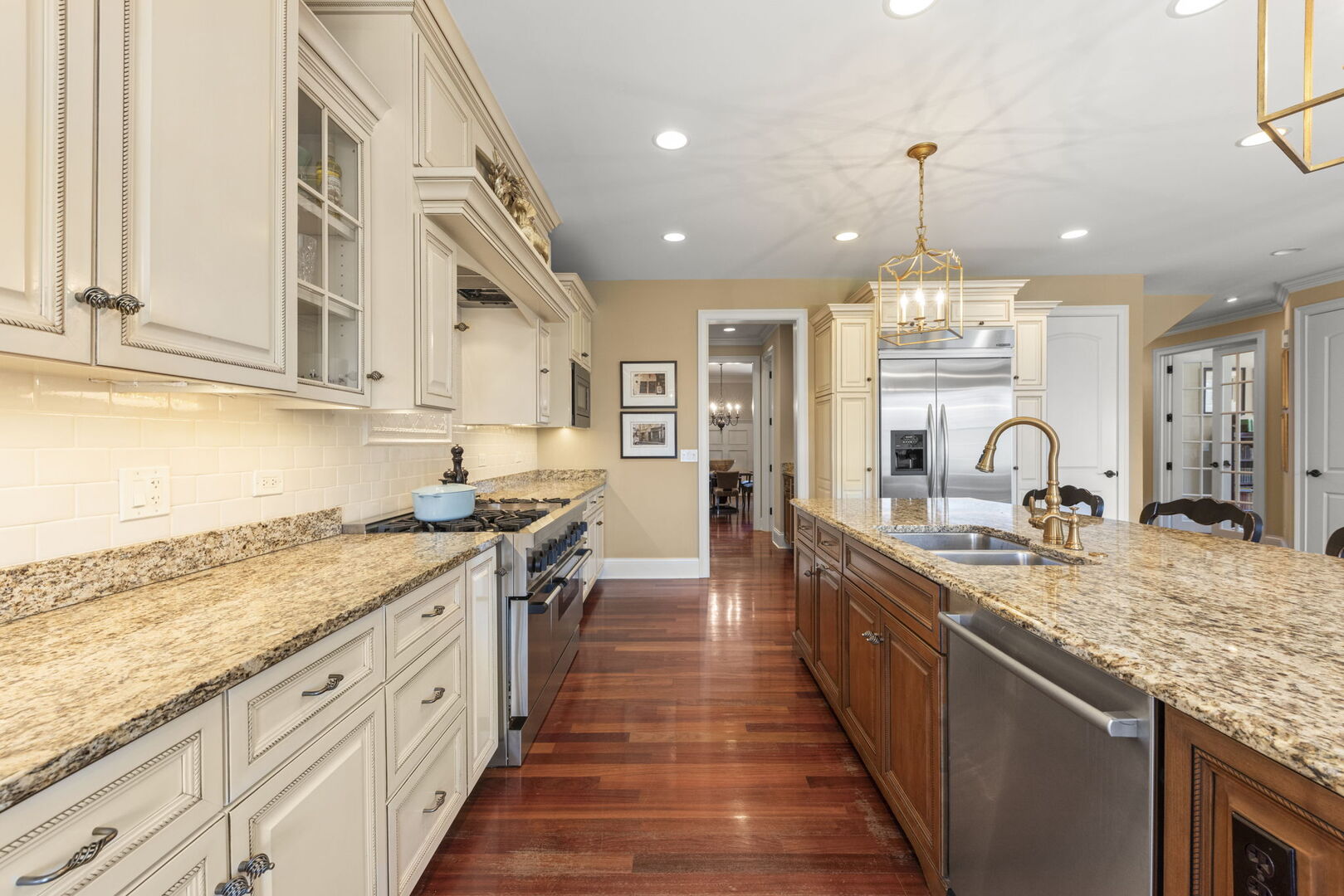 4804 Northcott Avenue Downers Grove, IL 60515 - Photo 12 of 36 a kitchen with stainless steel appliances granite countertop a sink stove and cabinets