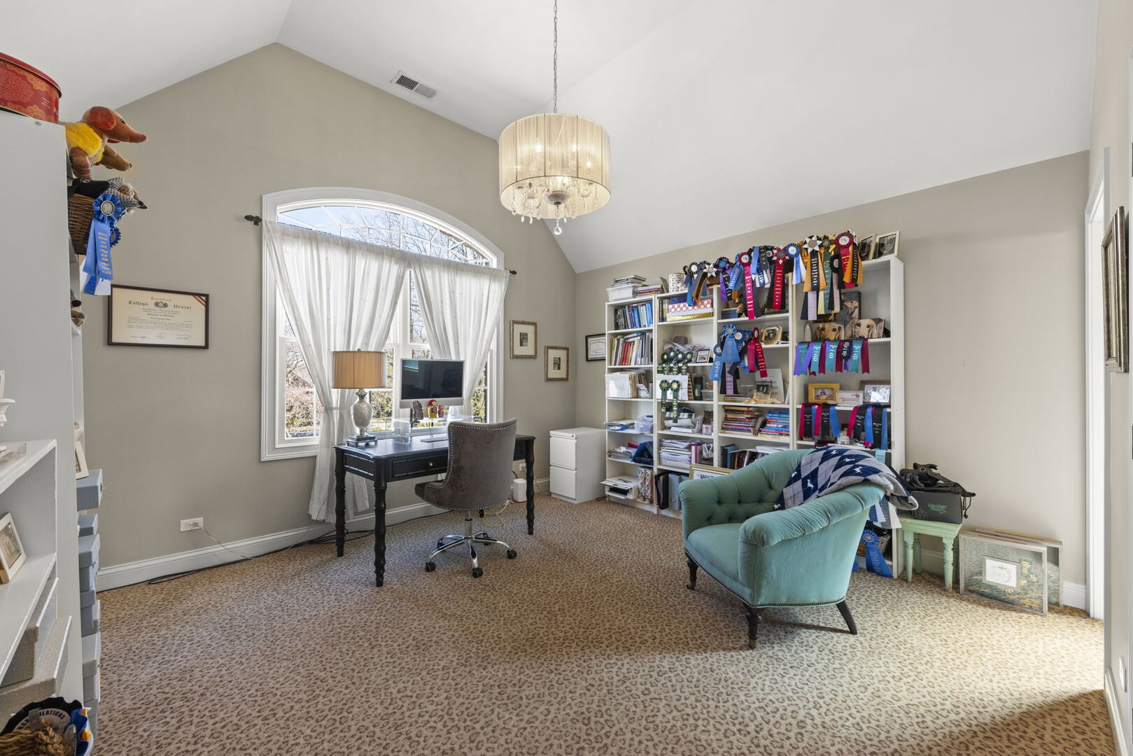 4804 Northcott Avenue Downers Grove, IL 60515 - Photo 29 of 36 a living room with furniture and a chandelier