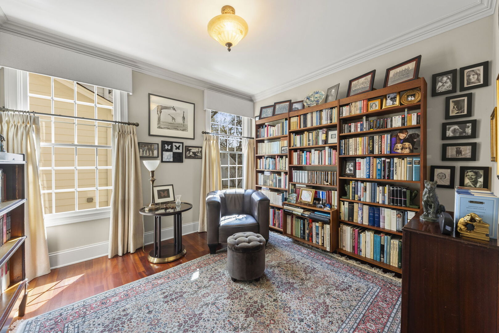 4804 Northcott Avenue Downers Grove, IL 60515 - Photo 7 of 36 a living room with furniture and a book shelf
