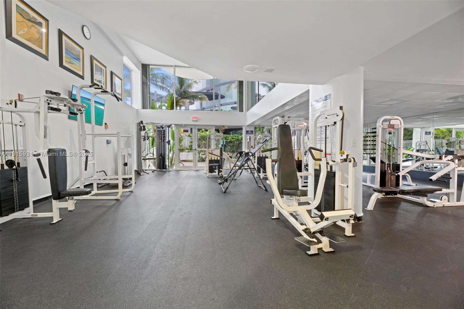 18671 Collins Avenue, Unit 1902 Sunny Isles Beach, FL 33160 - Photo 34 of 53 a view of a room with gym equipment