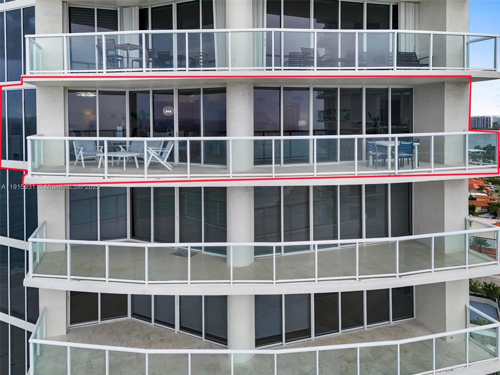 18671 Collins Avenue, Unit 1902 Sunny Isles Beach, FL 33160 - Photo 49 of 53 a large building with a window