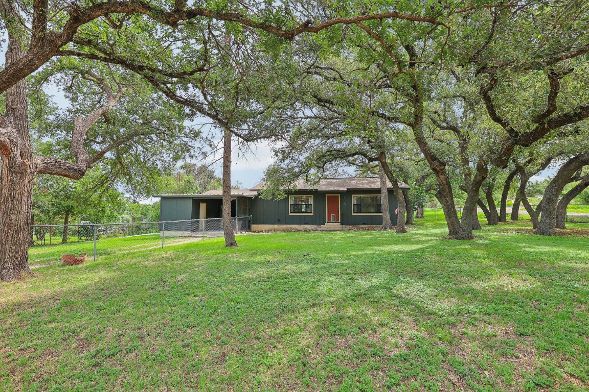 201 Bronco Drive Burnet, TX 78611 - Photo 1 of 30 a big yard with large trees
