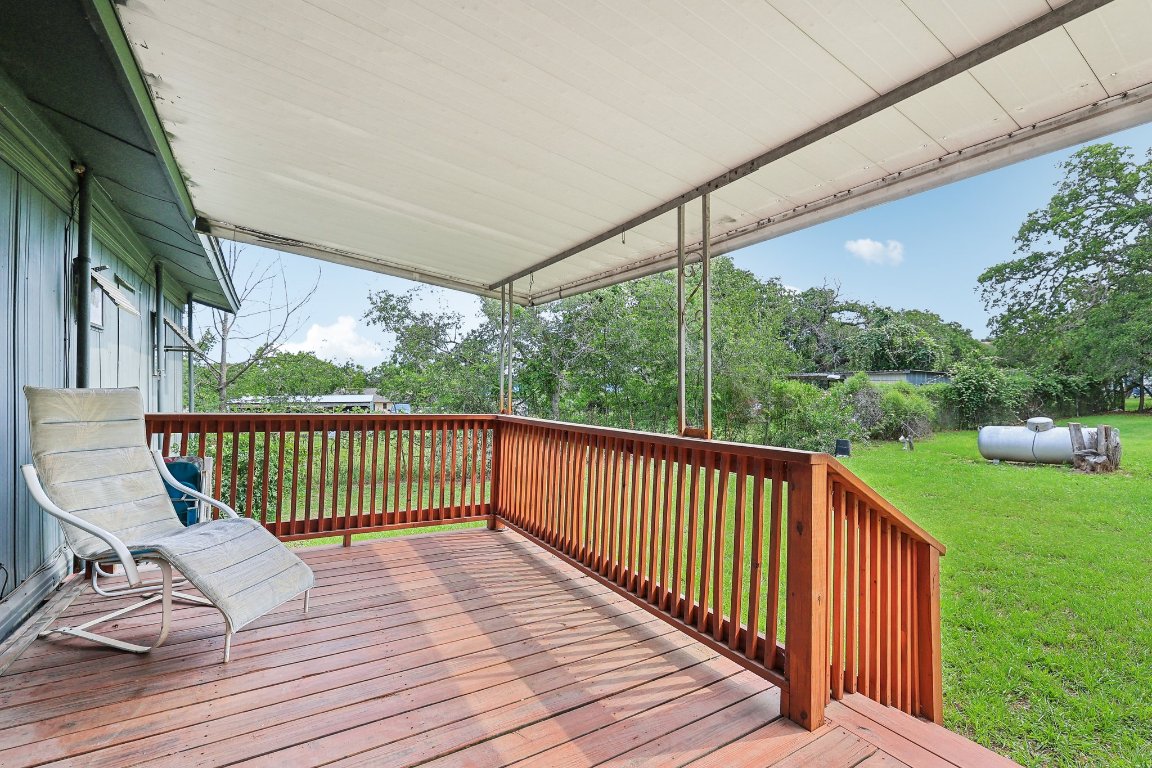 201 Bronco Drive Burnet, TX 78611 - Photo 21 of 30 a view of a deck with a chair