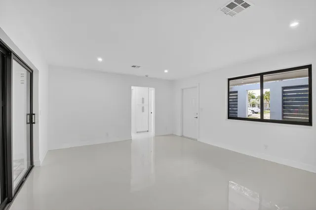 an empty room with windows