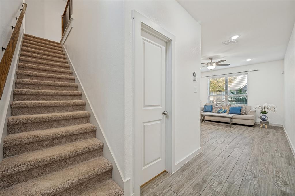 2741 Splendor Lane Little Elm, TX 75068 - Photo 4 of 32 Stairway to Bedrooms and loft area allow privacy while entertaining with others.