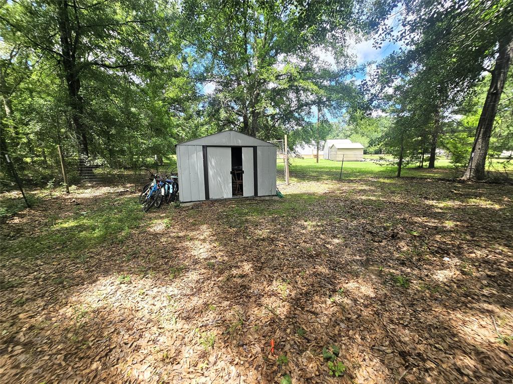 12910 Springhaven Drive Keithville, LA 71047 - Photo 26 of 33 Storage shed