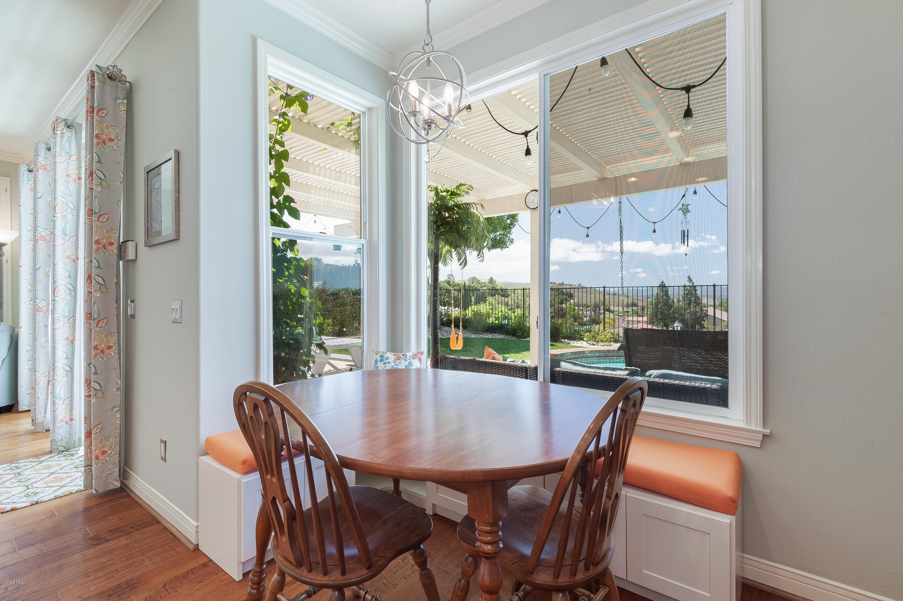 2452 Gillingham Circle Thousand Oaks, CA 91362 - Photo 14 of 43 a view of a dining room with furniture window and wooden floor