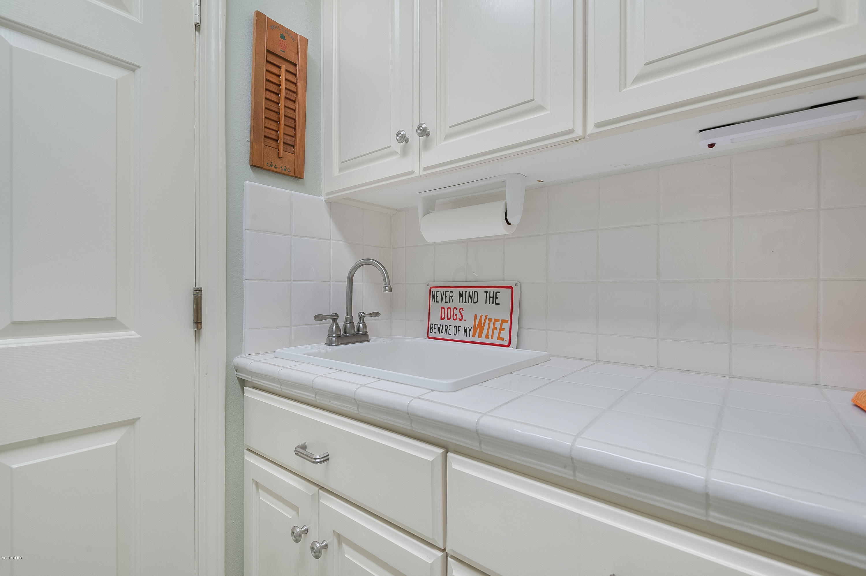 2452 Gillingham Circle Thousand Oaks, CA 91362 - Photo 20 of 43 a bathroom with a sink and cabinets
