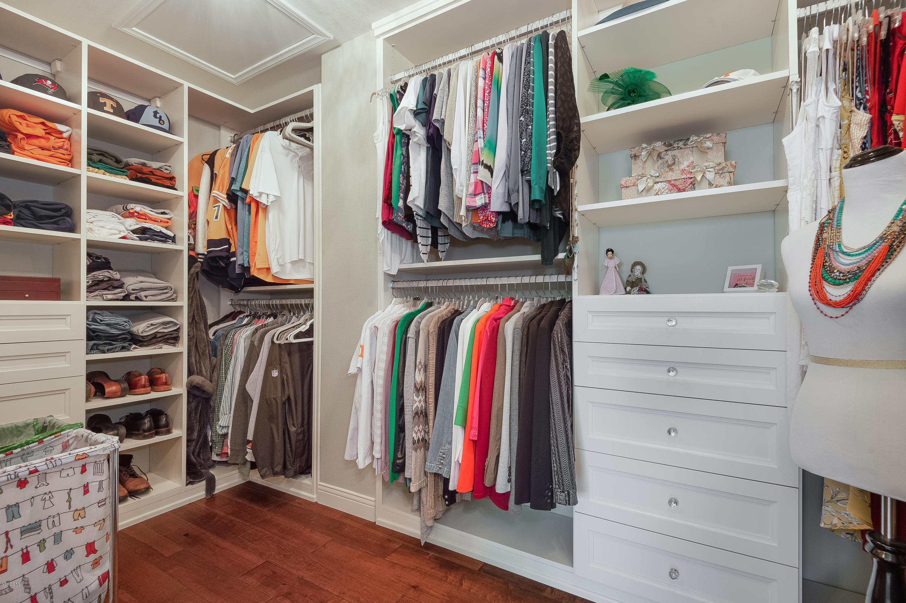 2452 Gillingham Circle Thousand Oaks, CA 91362 - Photo 28 of 43 a view of walk in closet with clothes and shoes