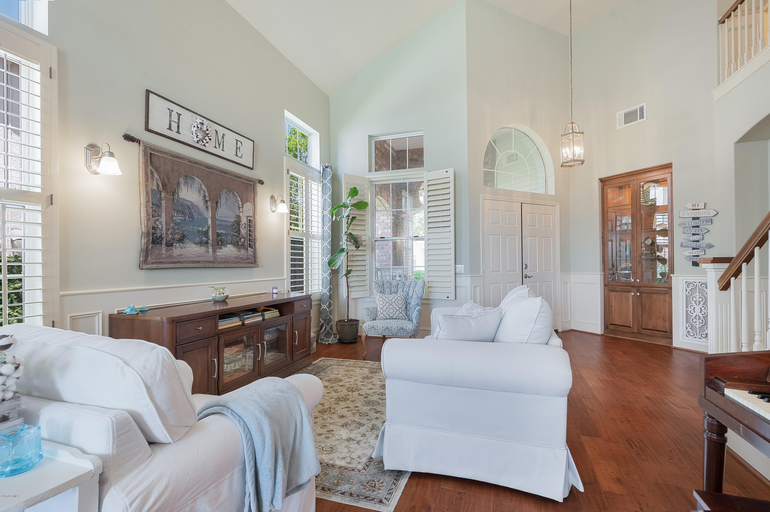 2452 Gillingham Circle Thousand Oaks, CA 91362 - Photo 8 of 43 a living room with furniture and a large window