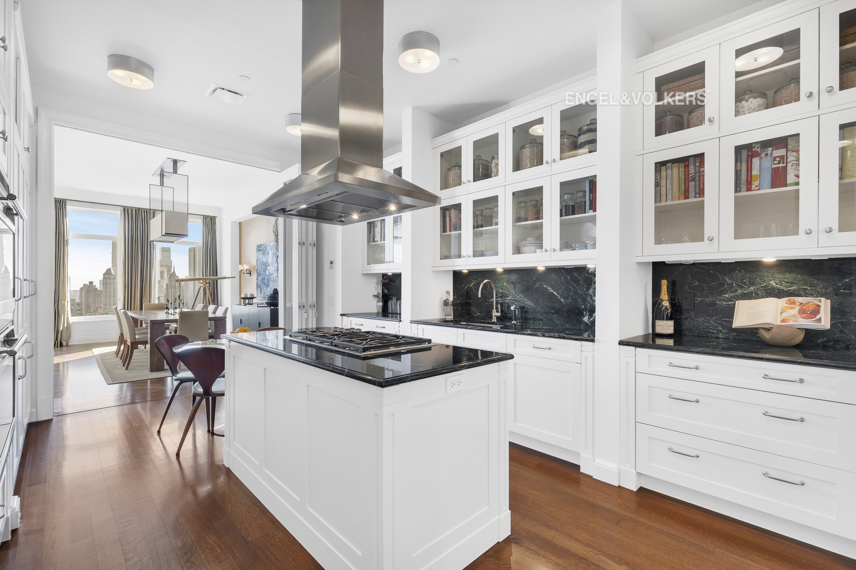 Undisclosed Address Manhattan, NY 10023 - Photo 7 of 23 a kitchen with a stove a refrigerator and wooden cabinets