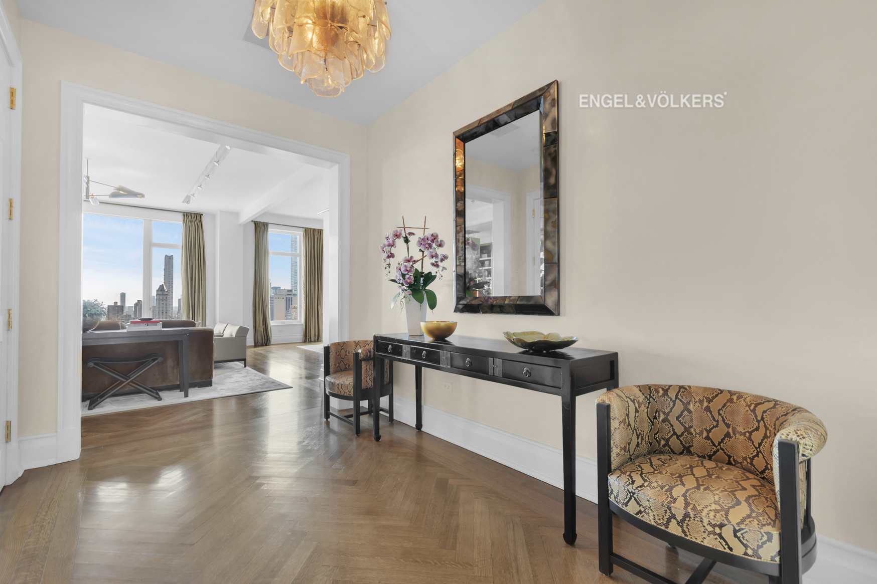 Undisclosed Address Manhattan, NY 10023 - Photo 9 of 23 a living room with furniture and a large mirror