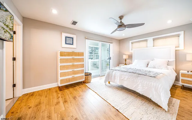 a bedroom with a bed and a walk in closet