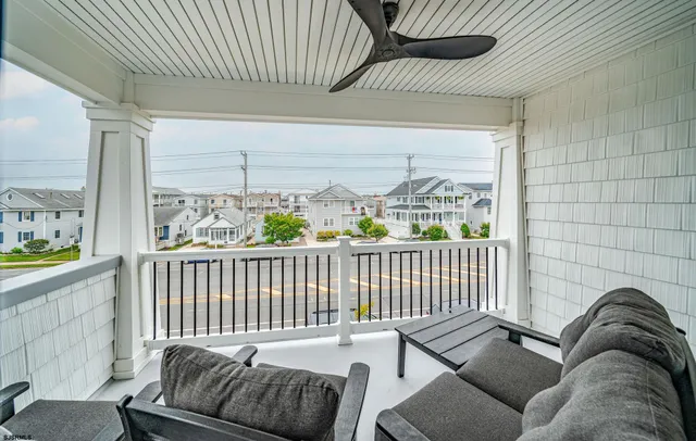 a balcony with furniture