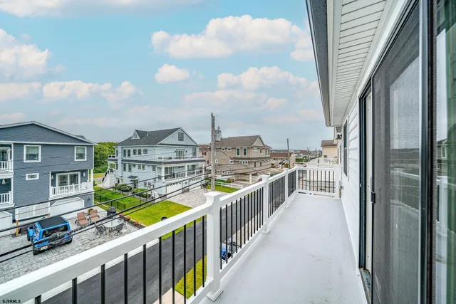 a view of a balcony with city view