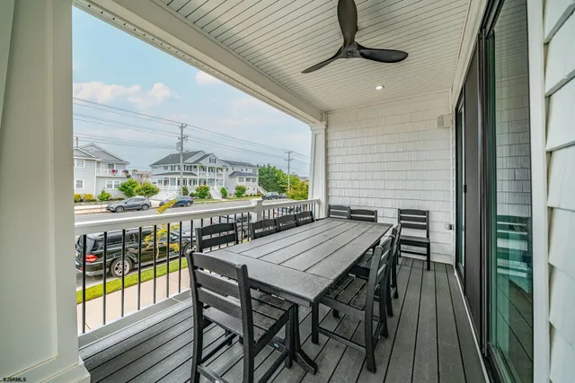 a view of a balcony with furniture