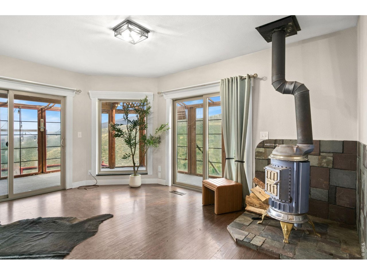 10828 Bears Lair Road Loveland, CO 80538 - Photo 6 of 50 Large Windows Allowing Plenty of Natural Light