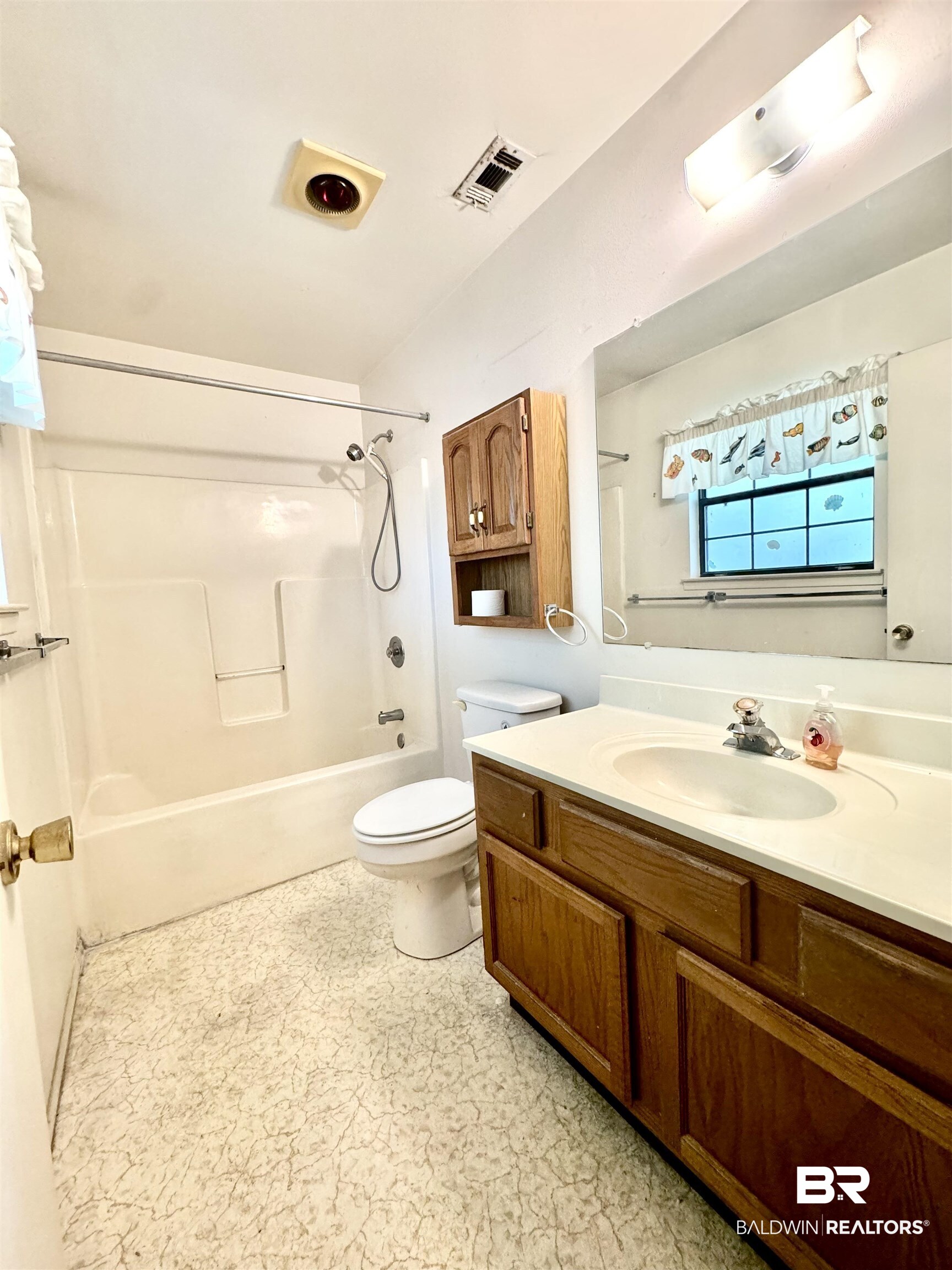 512 Deborah Court Foley, AL 36535 - Photo 21 of 23 Full bathroom featuring shower / bathing tub combination, vanity, and toilet