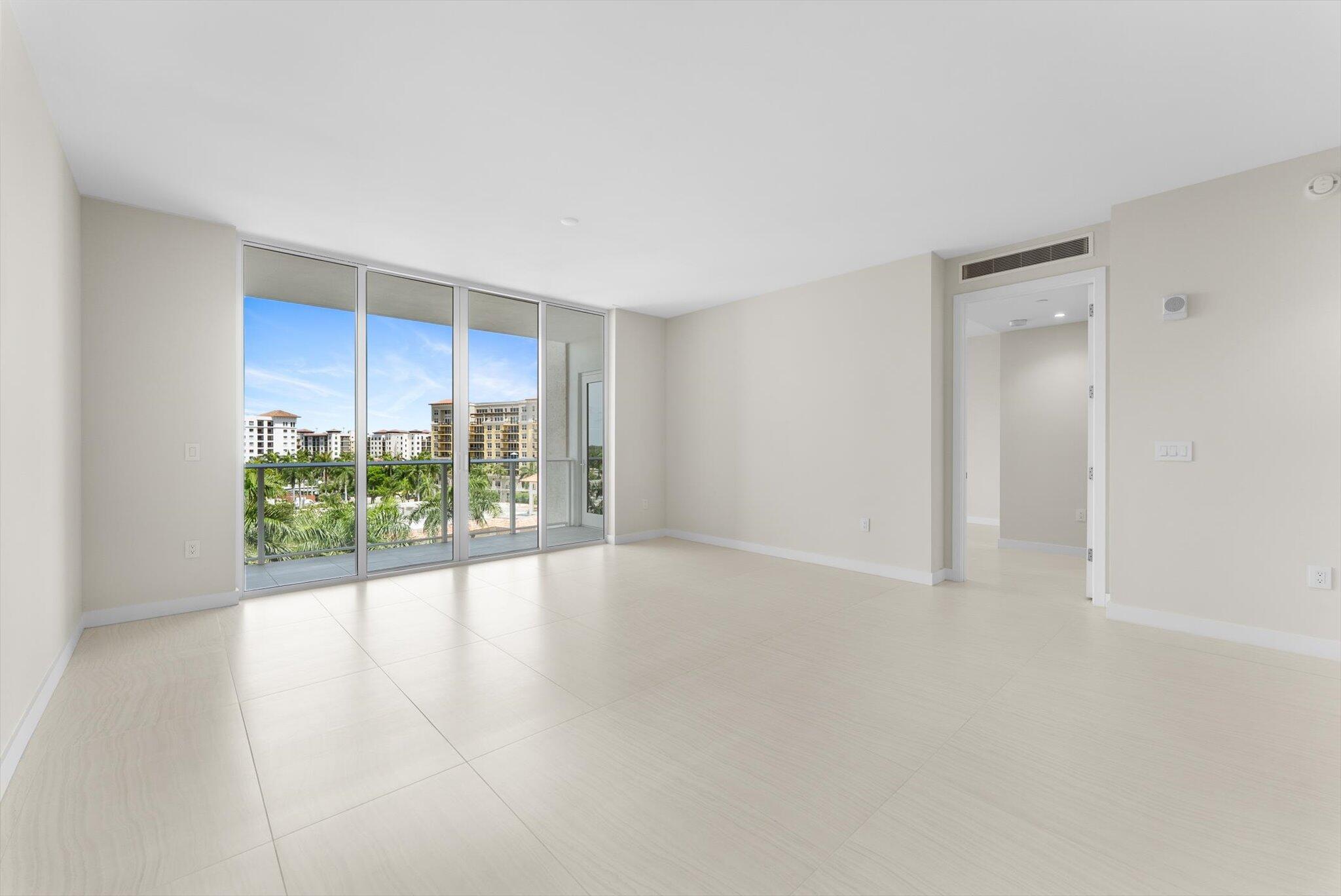 220 Southeast Mizner Boulevard, Unit 609 Boca Raton, FL 33432 - Photo 21 of 63 a view of an empty room with a window