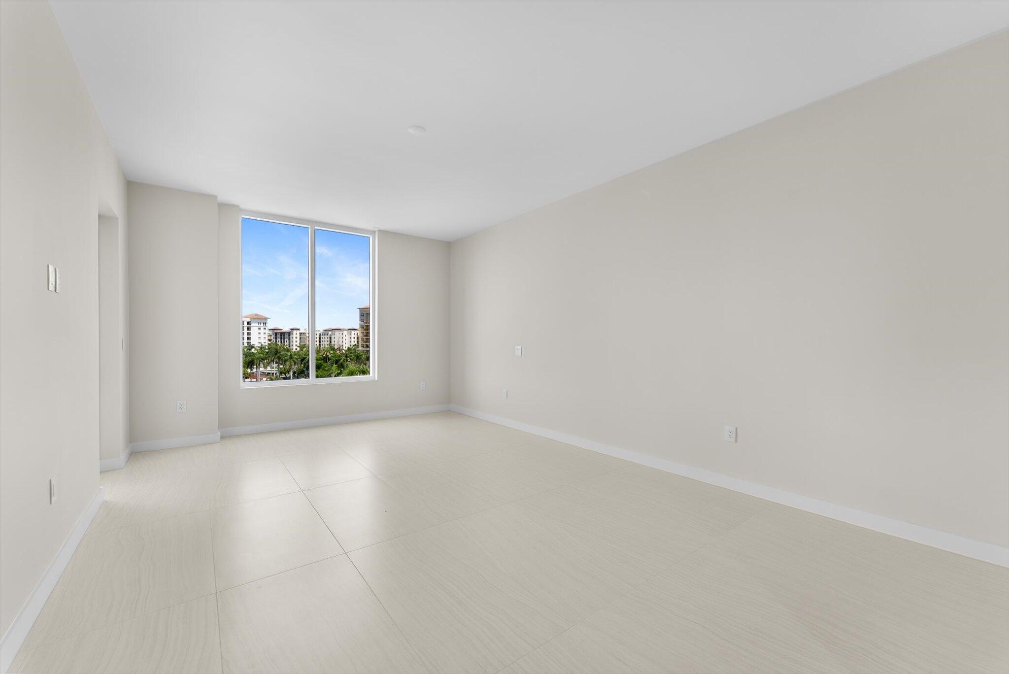 220 Southeast Mizner Boulevard, Unit 609 Boca Raton, FL 33432 - Photo 24 of 63 a view of an empty room and a window