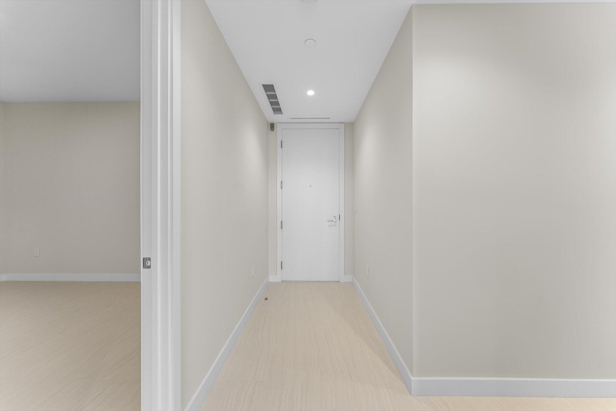 220 Southeast Mizner Boulevard, Unit 609 Boca Raton, FL 33432 - Photo 7 of 63 a view of a hallway