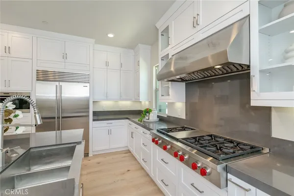 a view of an entryway and cabinets
