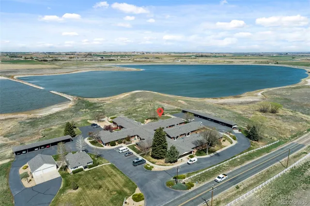 swimming view with lake view and mountain view