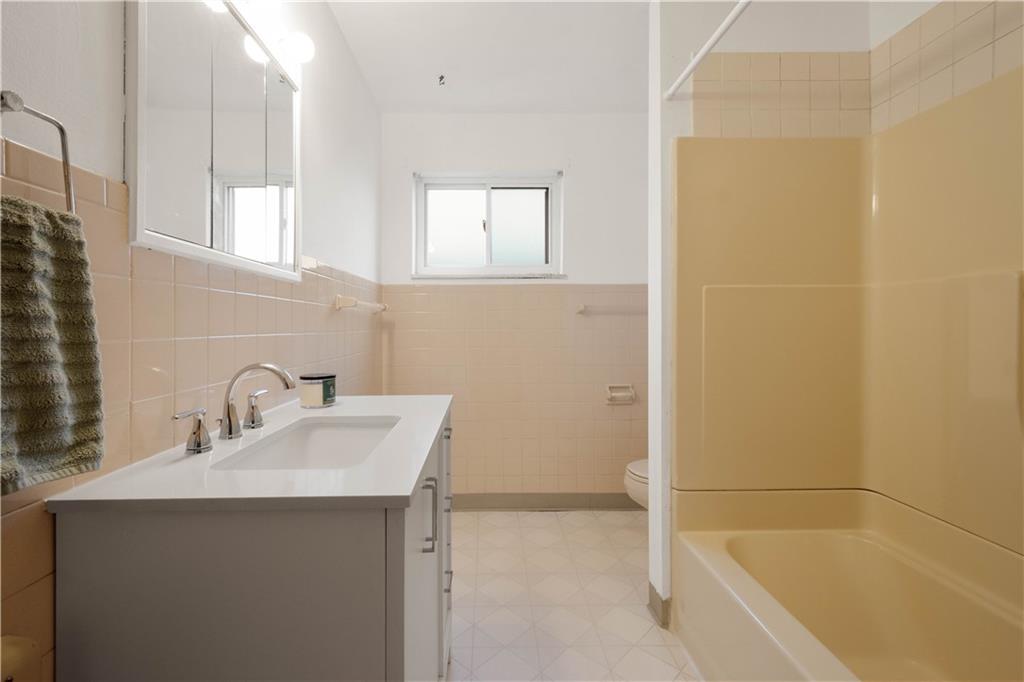 112 Washington Avenue Midway, PA 15060 - Photo 14 of 33 a bathroom with a sink and a bathtub