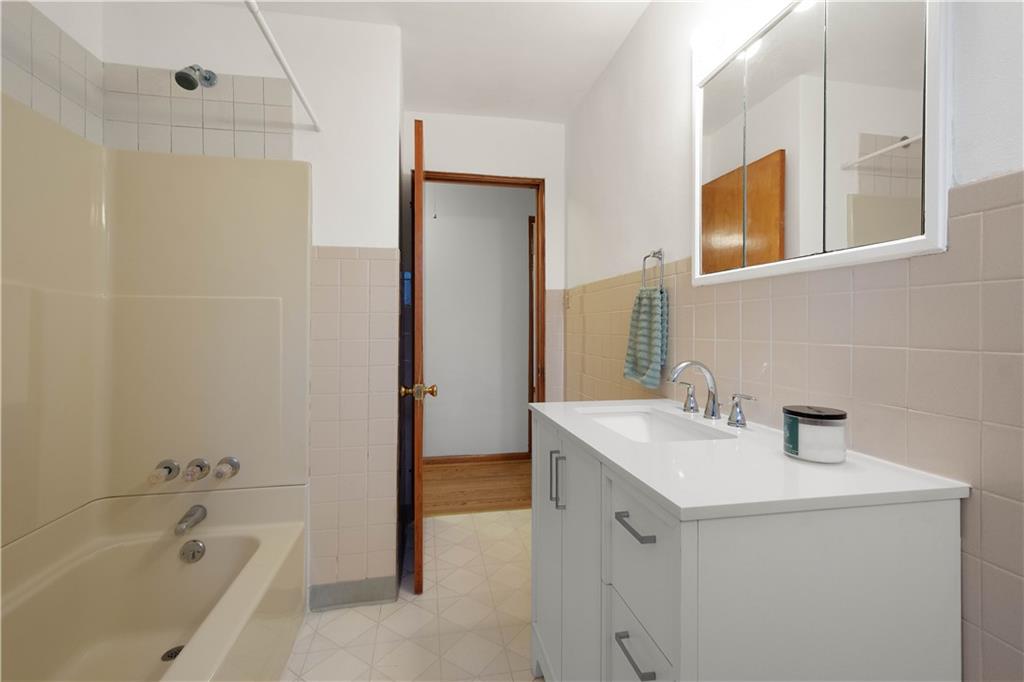 112 Washington Avenue Midway, PA 15060 - Photo 15 of 33 a bathroom with a sink and a bathtub