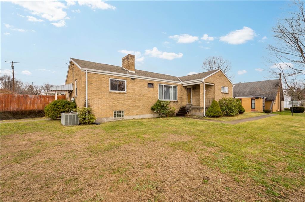 112 Washington Avenue Midway, PA 15060 - Photo 2 of 33 a view of a house with backyard and garden