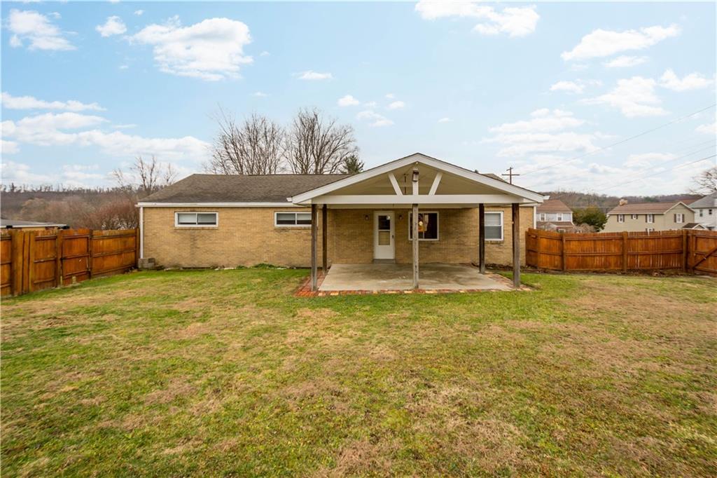 112 Washington Avenue Midway, PA 15060 - Photo 24 of 33 a front view of a house with a garden