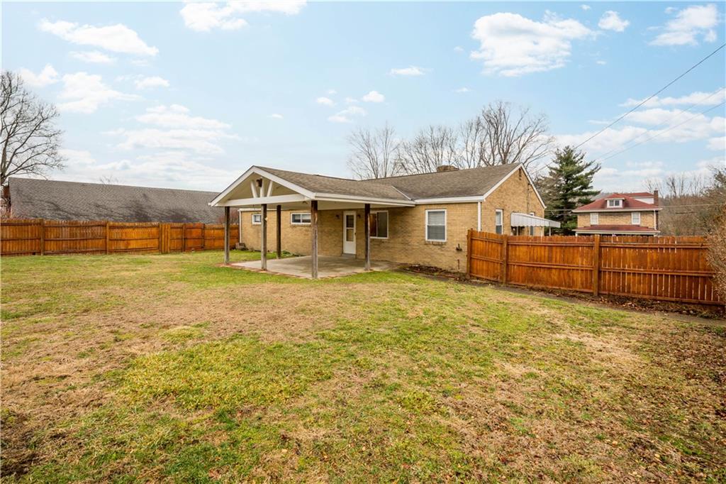 112 Washington Avenue Midway, PA 15060 - Photo 27 of 33 a view of a large garden with large tree