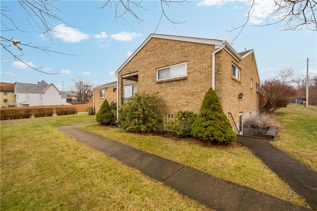 112 Washington Avenue Midway, PA 15060 - Photo 4 of 33 a view of a house with a yard