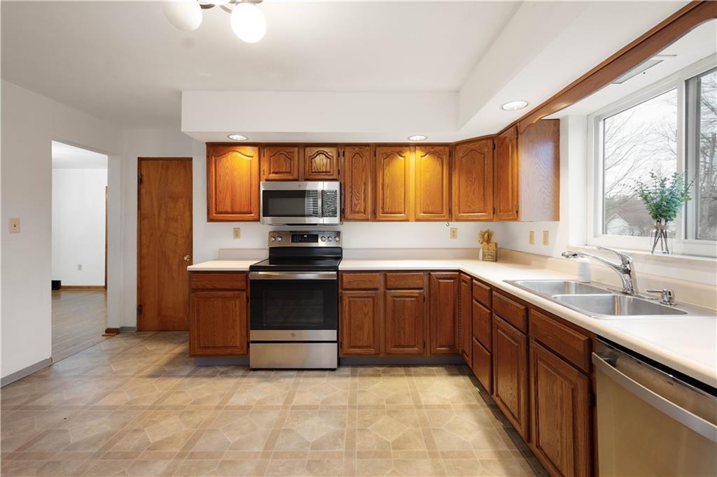 112 Washington Avenue Midway, PA 15060 - Photo 7 of 33 a kitchen with a sink appliances and cabinets