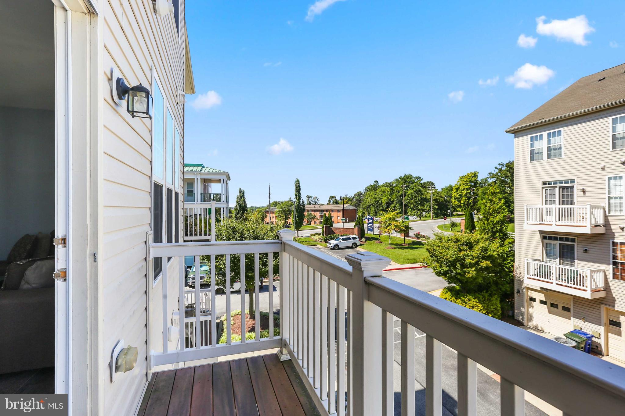 7209 Darby Downs, Unit 7209 Elkridge, MD 21075 - Photo 17 of 19 a view of a balcony with city view