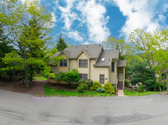 a house view with a garden space