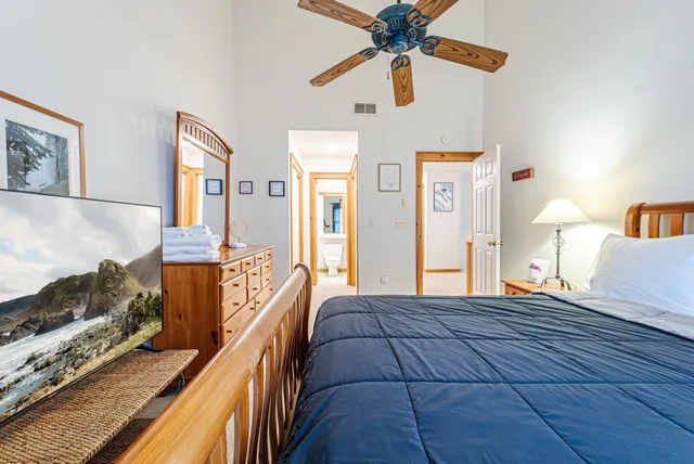 a bedroom with furniture and a window