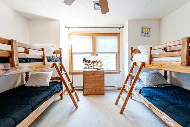 a bedroom with furniture