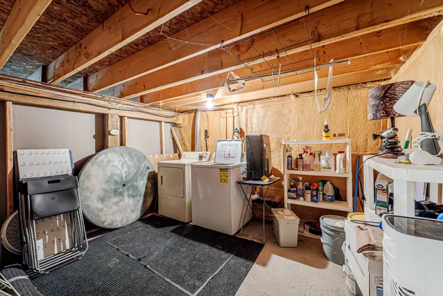 a view of a house with a yard and plants