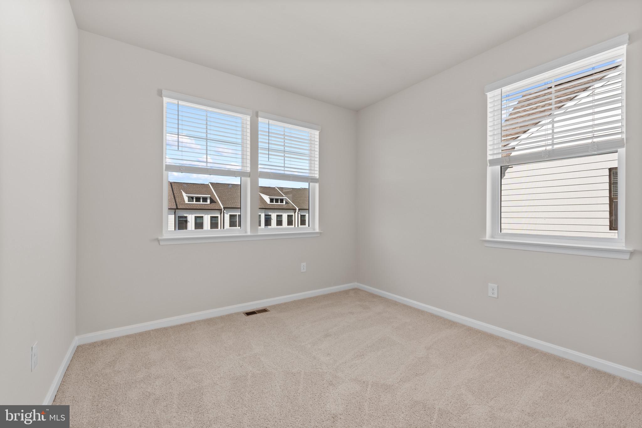 425 Ensemble Way Frederick, MD 21701 - Photo 24 of 37 a view of an empty room with a window